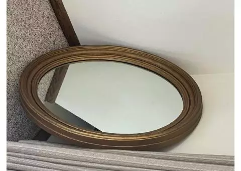 Oval wall glass mirror, gold frame