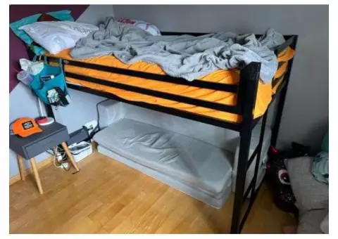 Twin metal loft bed frame with couch underneath